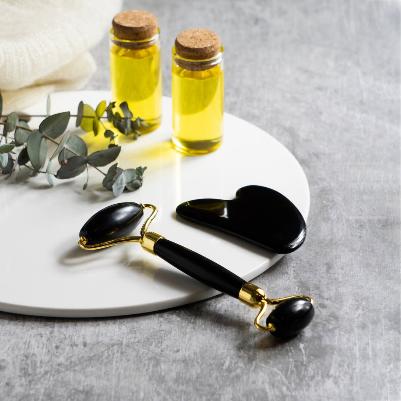 Roller & Gua Sha en pierre d'obsidienne