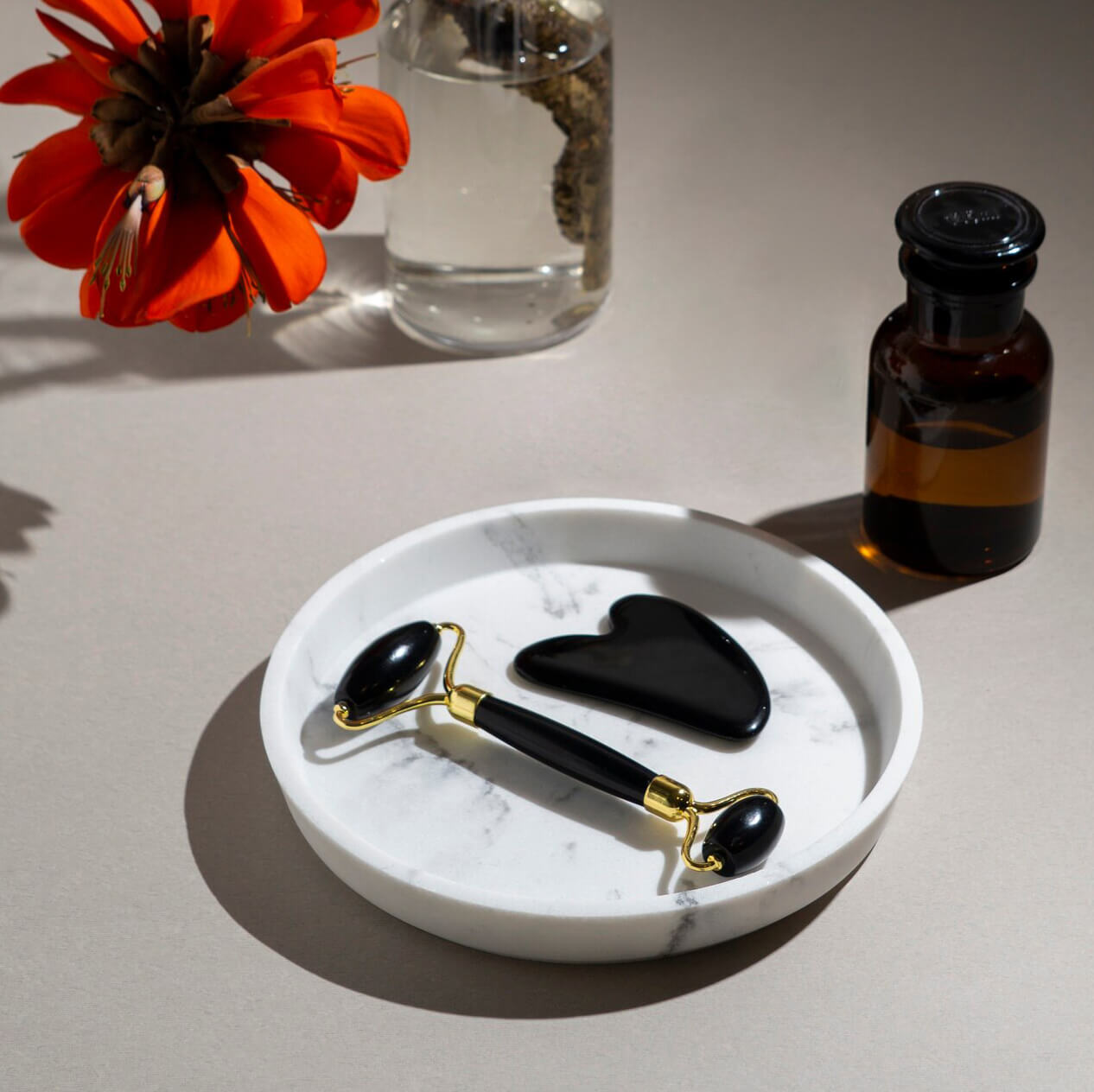 Roller & Gua Sha en pierre d'obsidienne